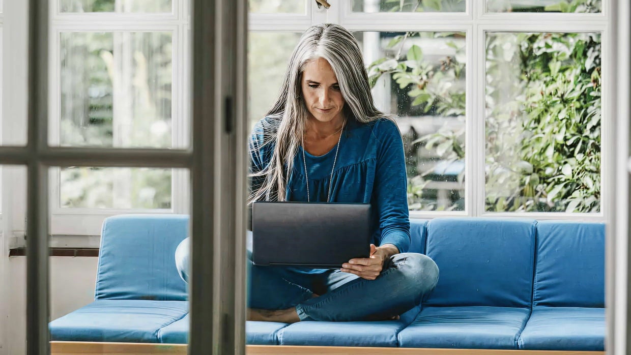 woman sitting in sun room