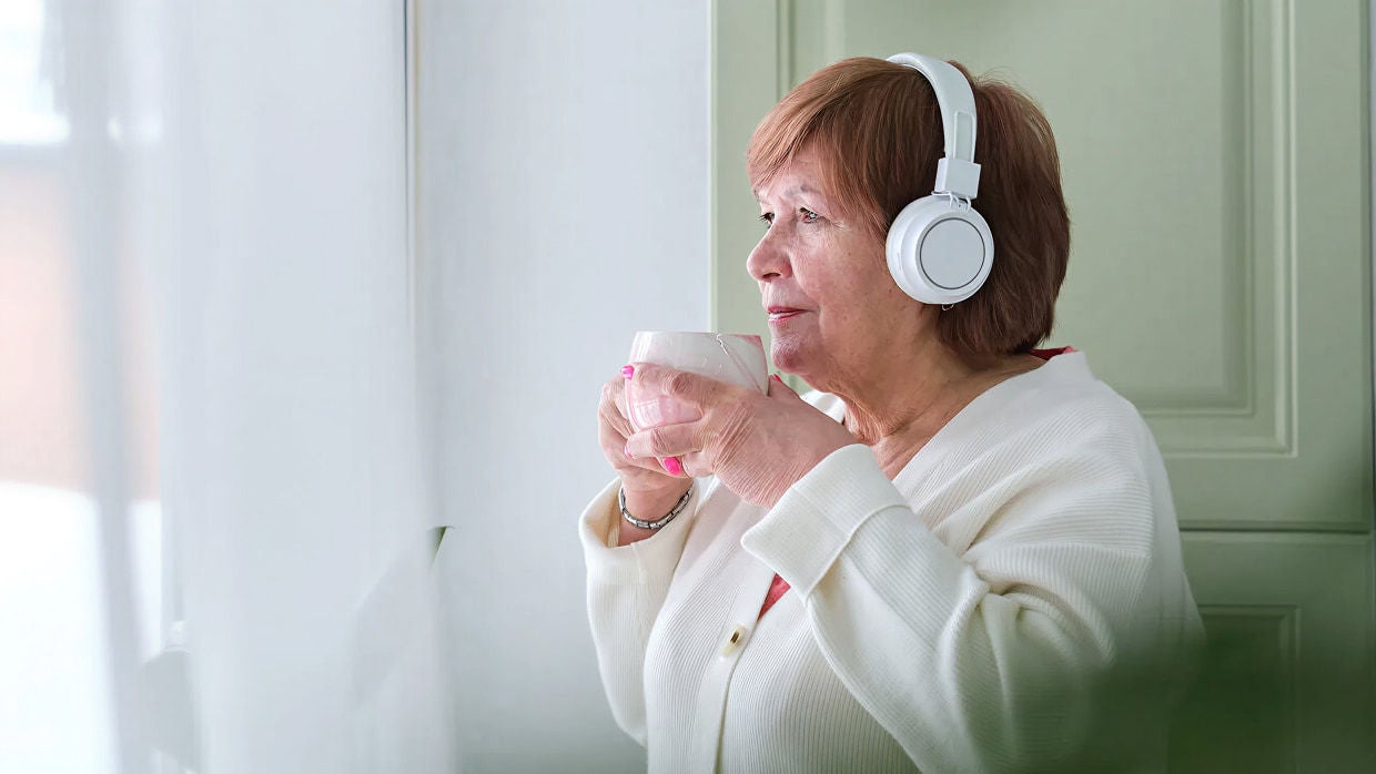 mature woman with headphones